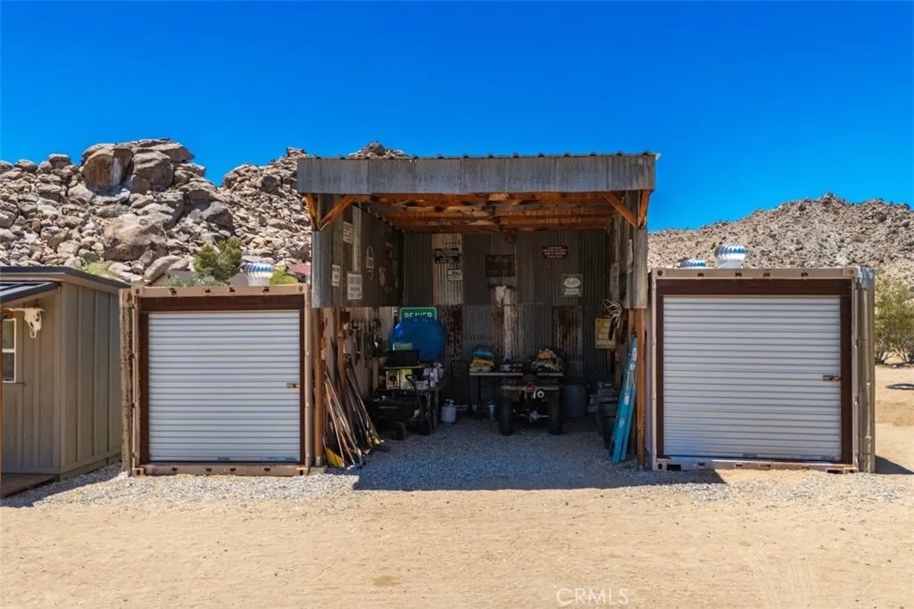 Bunkhouse and storage buildings, offering flexible space for guests, hobbies, equipment, or extra storage.