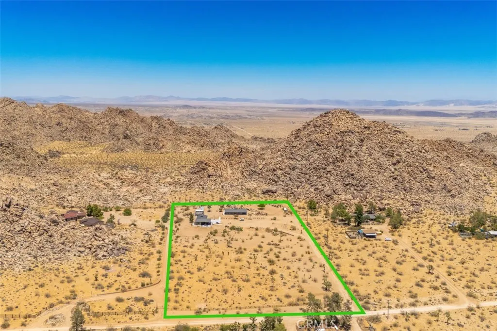 Our 4.5-acre property directly borders more than 640 acres of protected government land that will never be developed, creating an unmatched sense of privacy, open space, and breathtaking desert views.