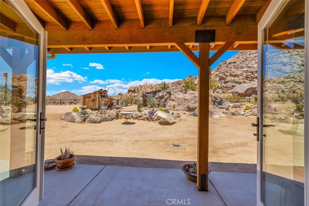View from the primary suite, showcasing the peaceful desert landscape just outside.