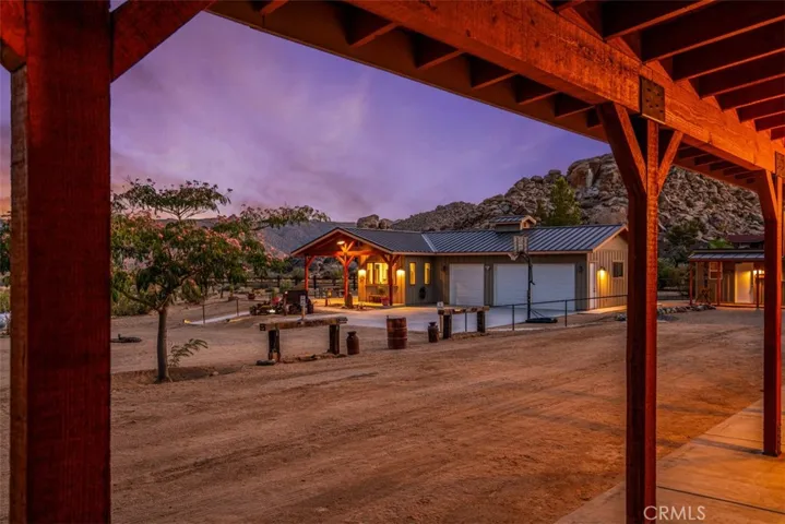 South facing view of guest house & garage