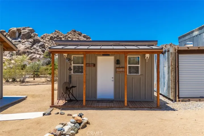 Bunkhouse and storage buildings, offering flexible space for guests, hobbies, equipment, or extra storage.