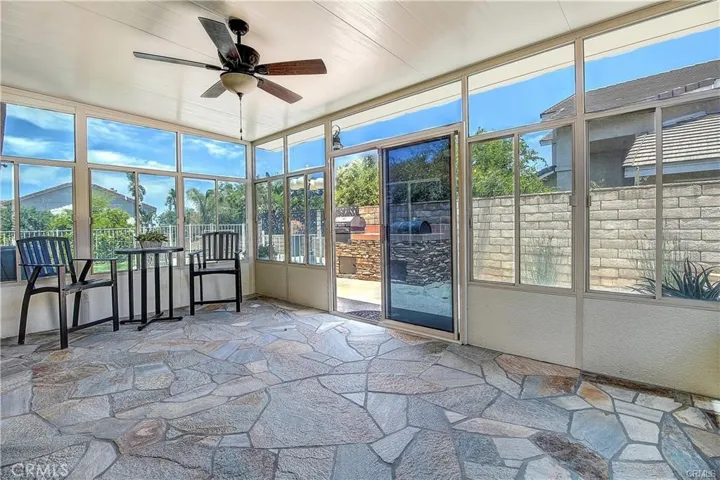 Sunroom with ceiling fan