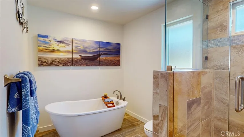 Ensuite bath with soaking tub and walk-in shower.