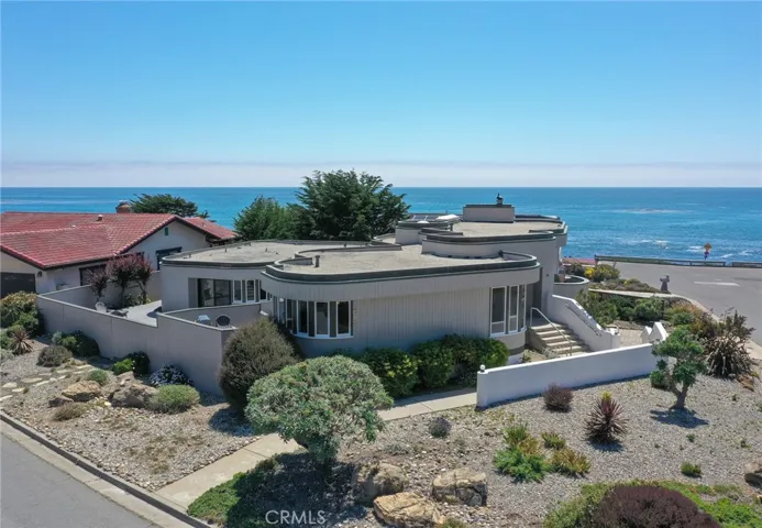 Architecturally distinctive residence with ocean views in coveted Seaclift Estates.