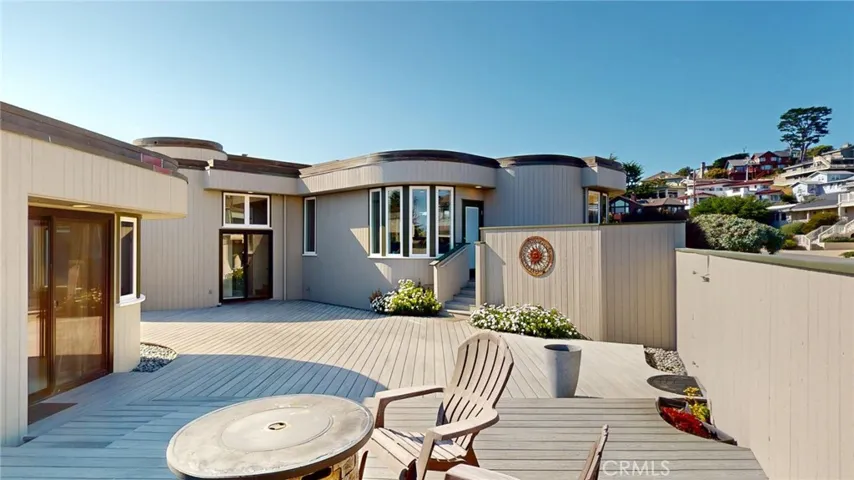 Wind-sheltered courtyard offers comfortable outdoor living year-round.