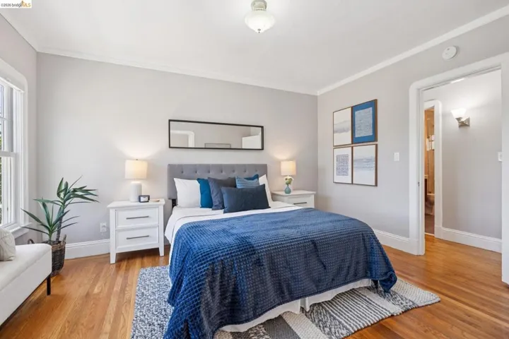 Hardwood flooring and light gray wall tones
