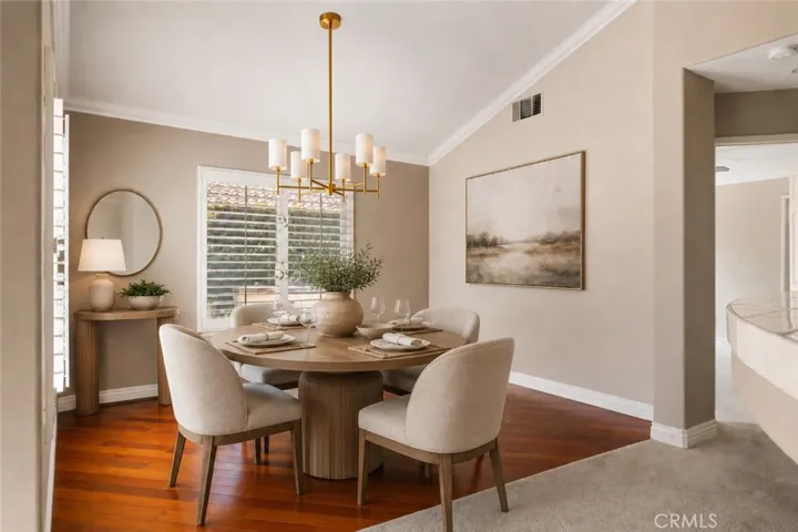 Dining room. Digitally enhanced with virtually staged furniture