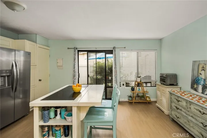 Another view of the Kitchen looking West towards the private patio.