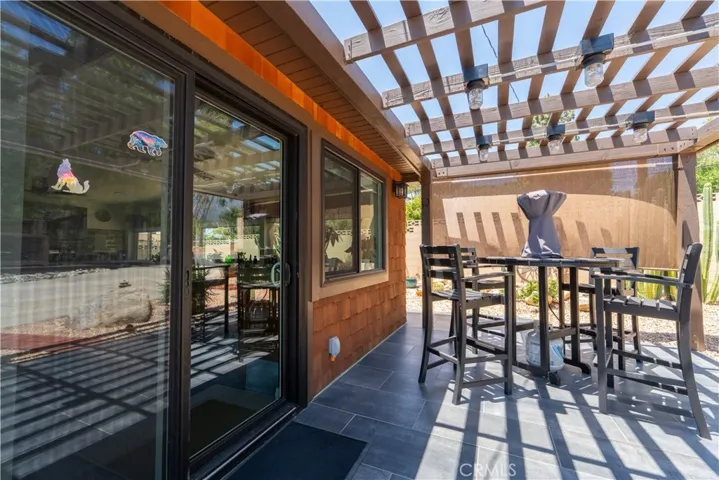 Rear sliding door from the Lounge out onto your pergola covered patio