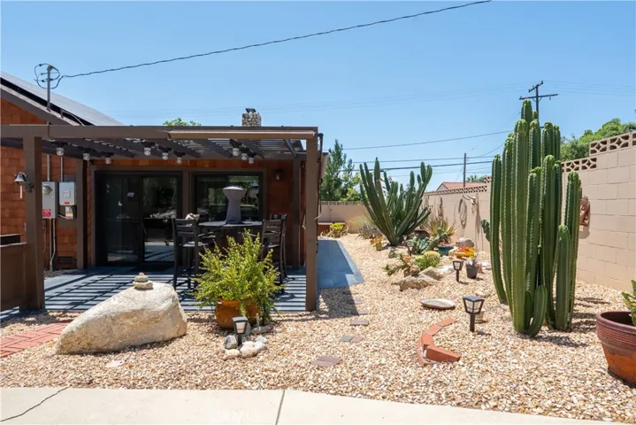 Pergola covered patio and cactus garden