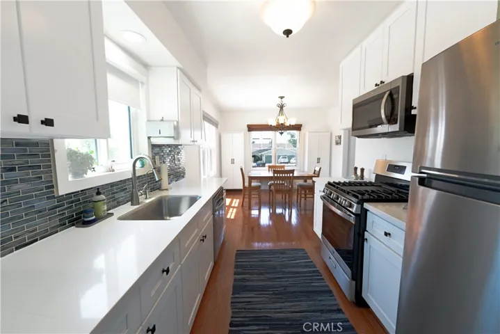 Bright and beautiful kitchen, looking into dining room