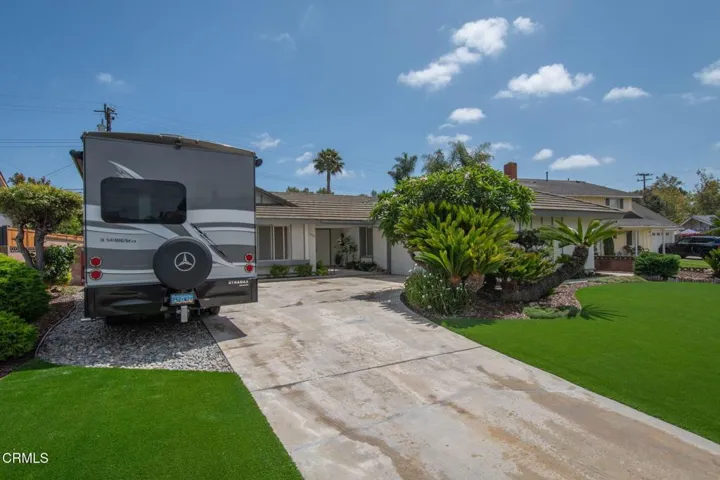 Front of home with RV