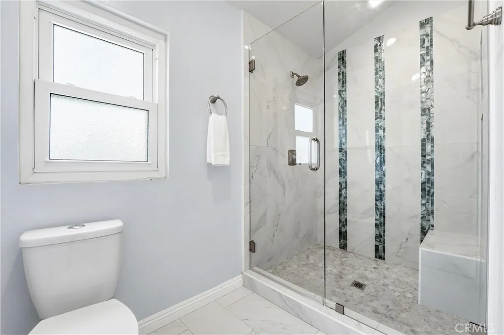 Primary bathroom with enlarged shower