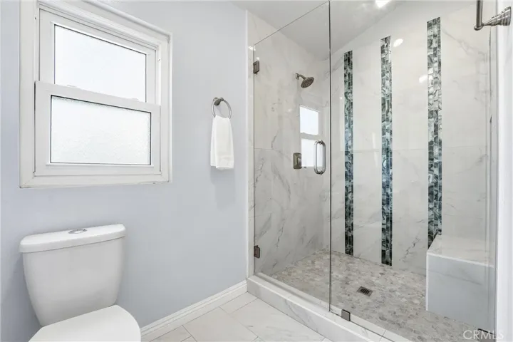 Primary bathroom with enlarged shower