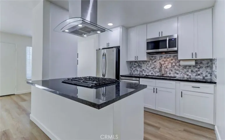 More photos coming soon. Modernized kitchen with open concept. Photo from prior to current tenant.