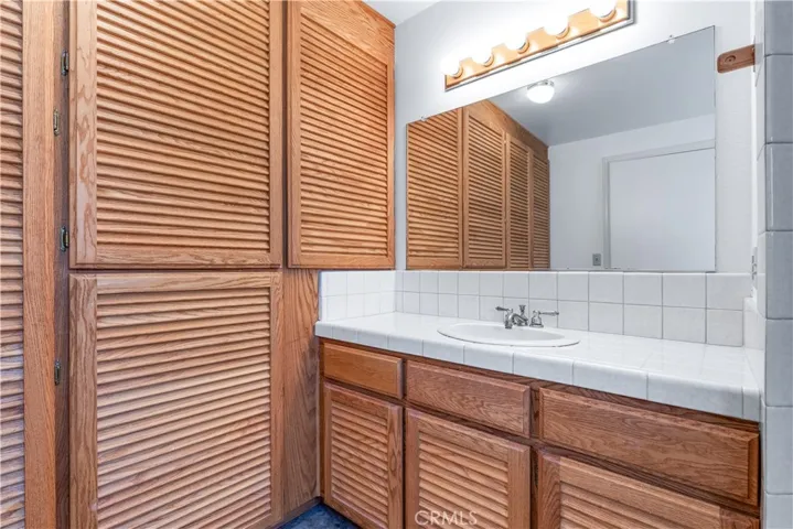 You will love the extra storage in the third bathroom, providing plenty of space to keep your essentials organized and within reach.