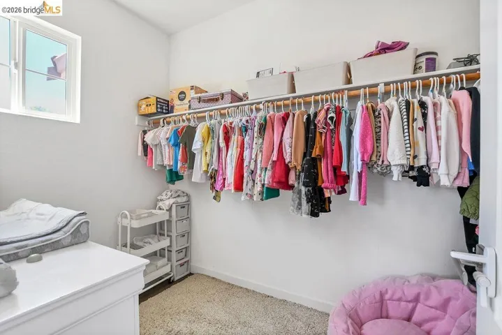 Bright closet space with a window