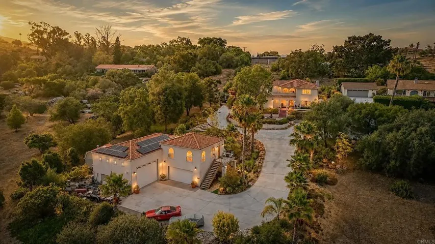 Property overview of main house and guest house and garage.
