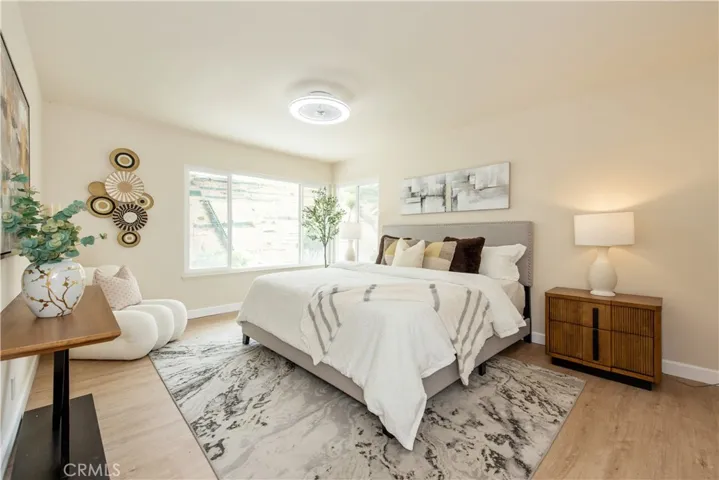 Primary Bedroom- low profile 3-light LED light and 6-speed ceiling fan