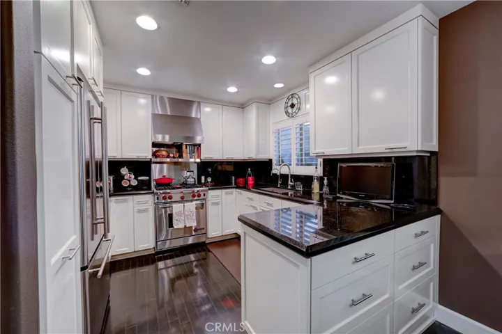 Kitchen w/Wolf stove, double door fridge