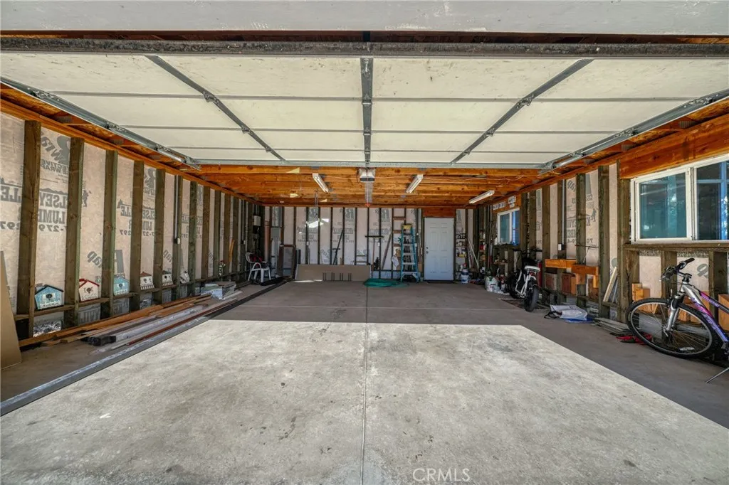 2 car garage with attic storage. 24ftx24ft
