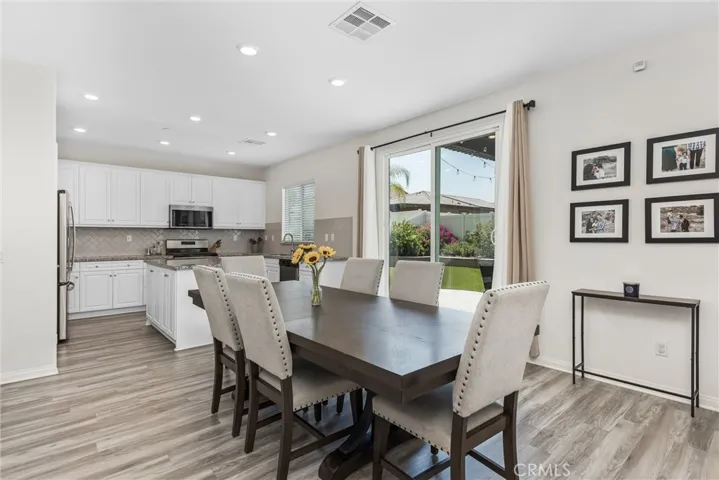 Plenty of room for the dining area just off of the kitchen. Large slider leading out to the back yard