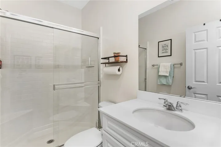 Downstairs bathroom has a walk in shower