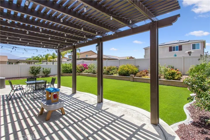 Backyard delight with large patio and cover