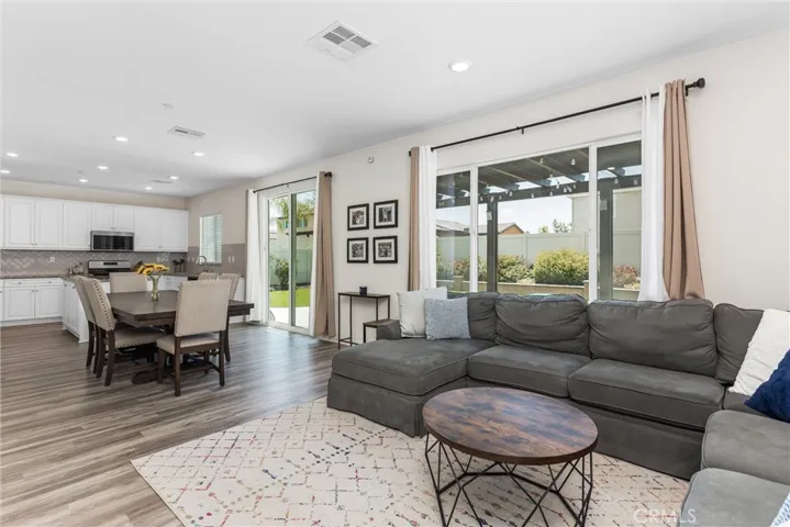Open floorplan with living room, dining area and kitchen all open to one another