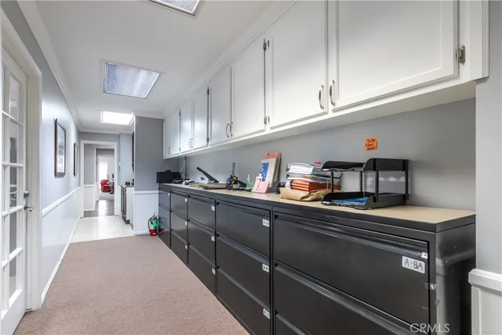 At the end of the tan carpet starts unit 205 which is currentlt being leased by the seller.