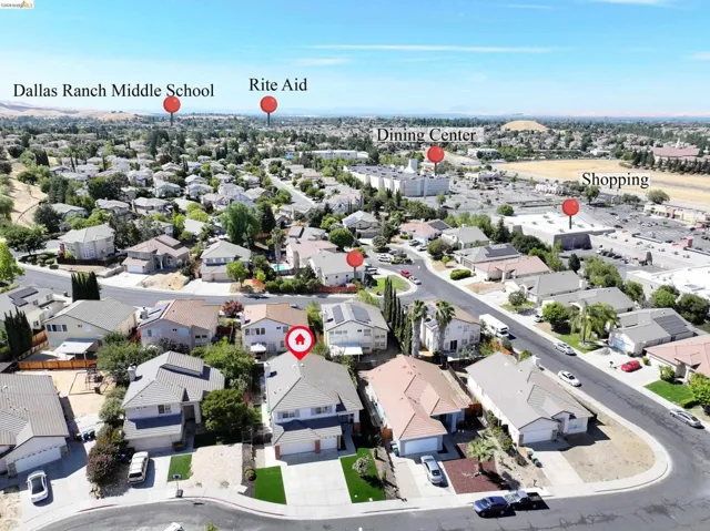 Aerial perspective showcasing a residential neighborhood with a density of single-family homes