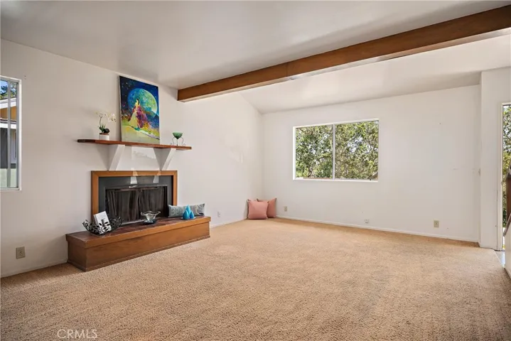 Open living & dining area and views of the trees.