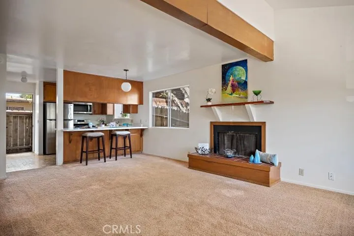 Galley style kitchen with breakfast bar.