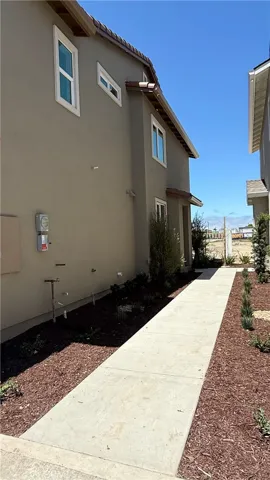 Side View and Pathway to Front Door