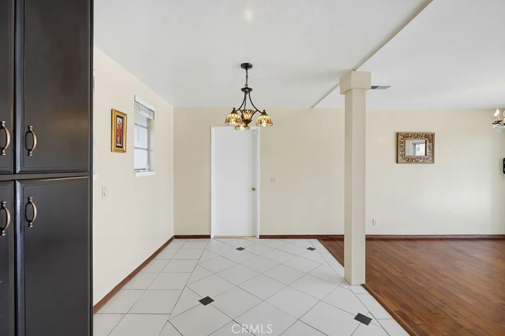 Kitchen looking to laundry area entry door