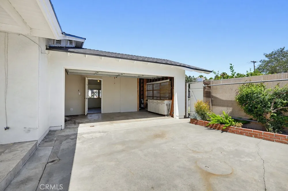 Private attached garage in back yard