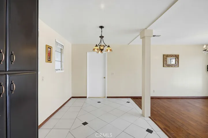 Kitchen looking to laundry area entry door
