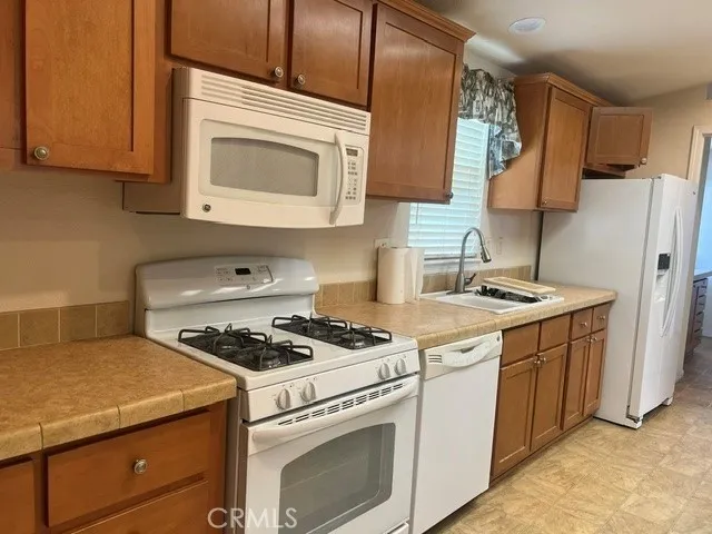 Fully Equipped Chefs Kitchen with Center Island, All Appliances, Gas Range, Microwave, Dishwasher, Stupendous Pantry