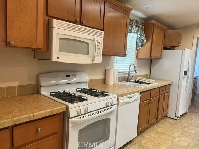 Fully Equipped Chefs Kitchen with Center Island, All Appliances, Gas Range, Microwave, Dishwasher, Stupendous Pantry