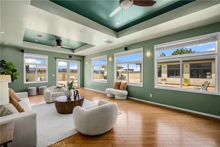 Large family room, with views to backyard and pool