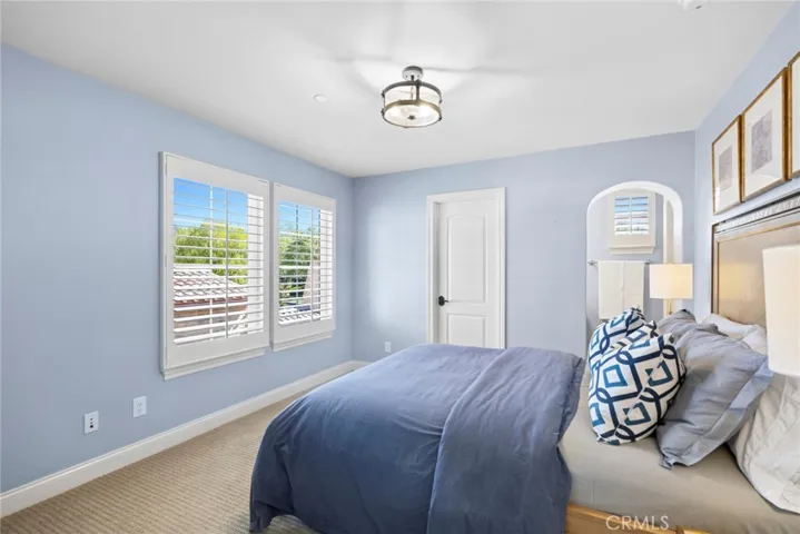 Secondary bedrooms feature plantation shutters & flexible space for family & guests