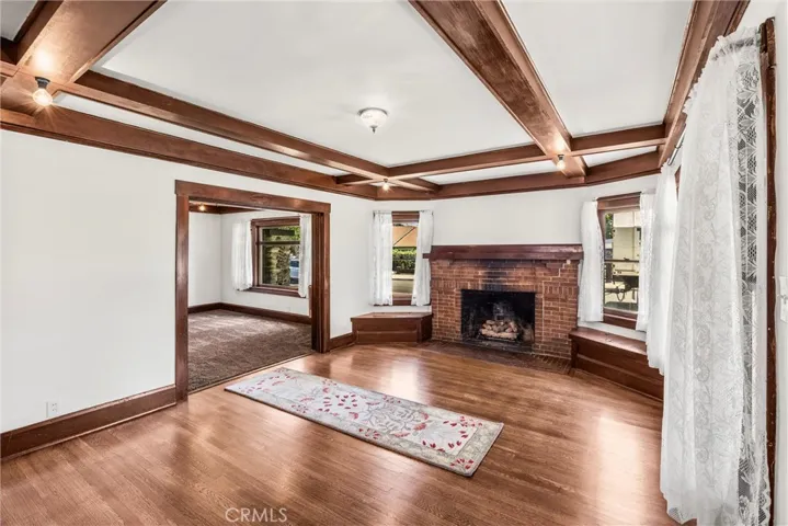 Glorious with wood floors and beamed ceilings