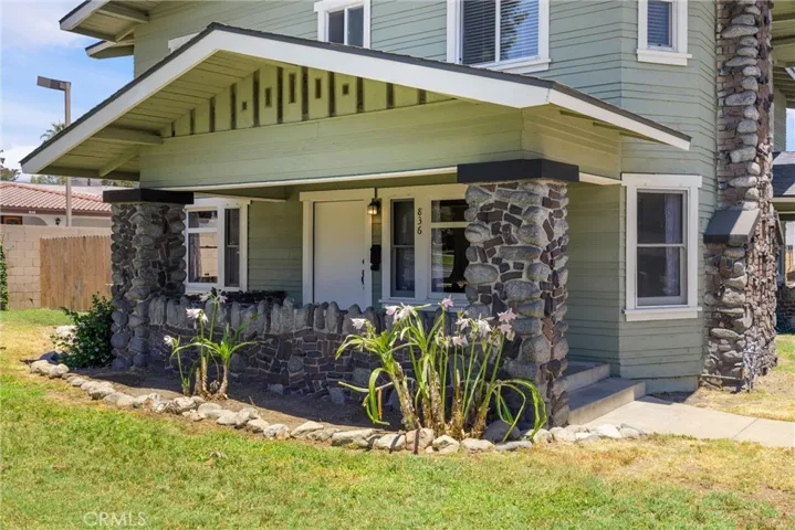 Craftsman square brick columns with roof overhang