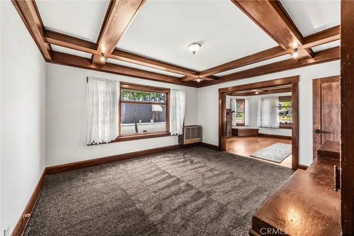 Versatile room near the living room with large builtin hutch