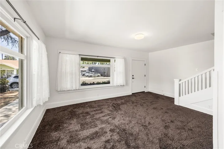 Living room in second smaller unit