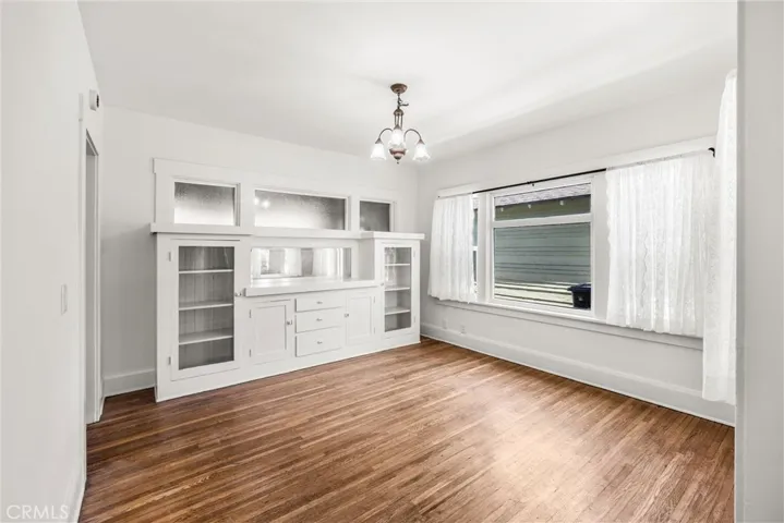 Very nice dining room with builtin china cabinet in second unit