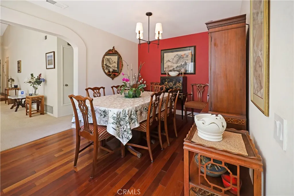 Another view of the dining room highlighting its welcoming atmosphere and convenient location near the kitchen