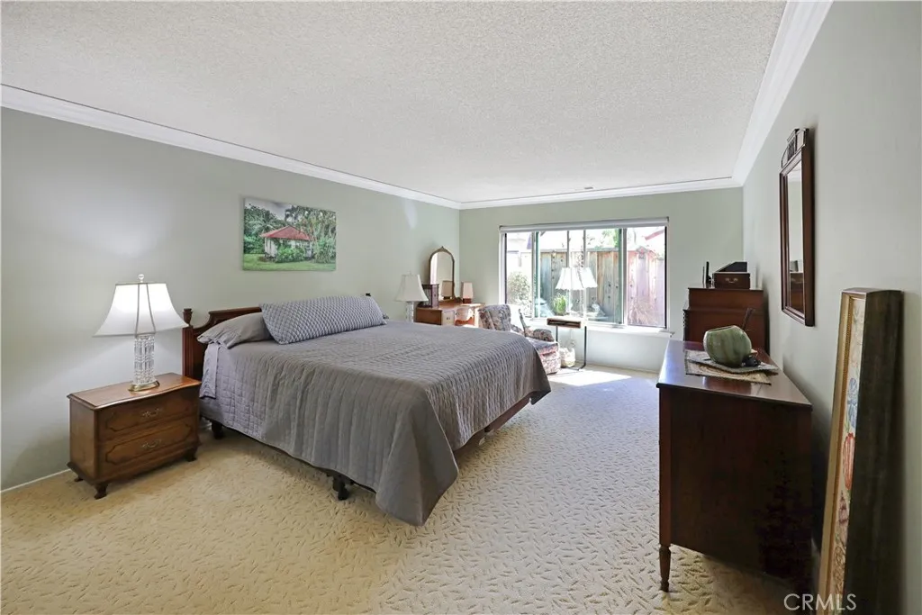 Primary bedroom offering flexible space with abundant natural light
