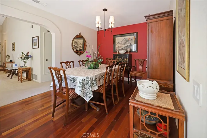 Another view of the dining room highlighting its welcoming atmosphere and convenient location near the kitchen