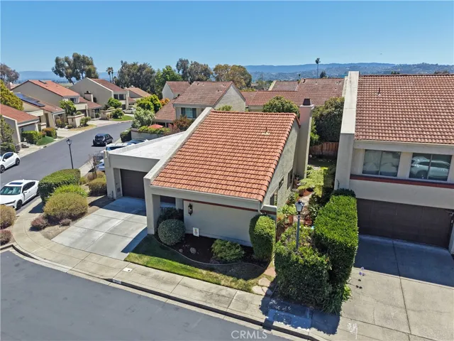 Elevated aerial perspective showcasing the home's location within a well-maintained neighborhood